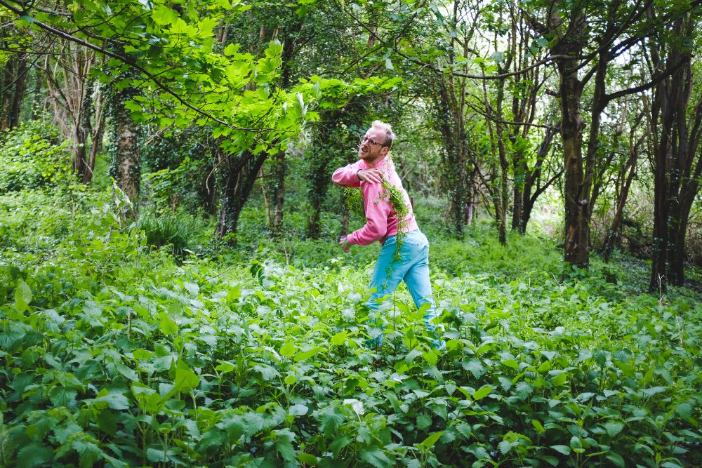 me in a forest trying to get some green stuff off my back
